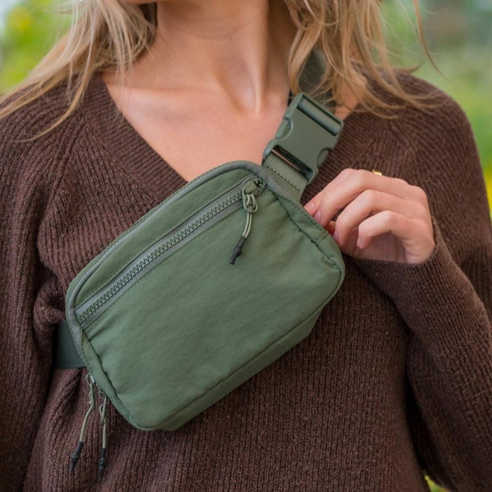Aria Belt Bag in Army Green Worn as a Crossbody Bag