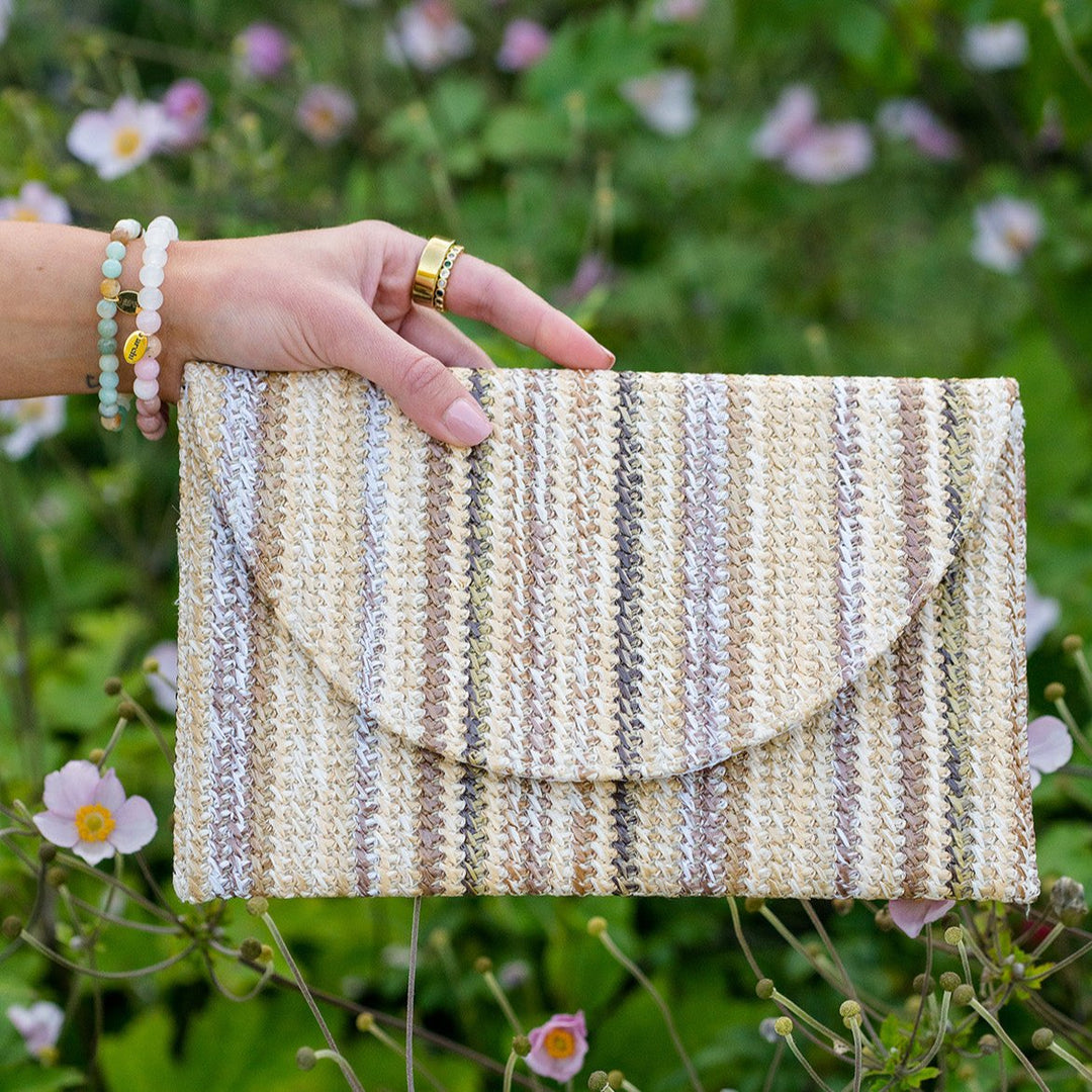 A detailed shot of the woven nylon fabric, showcasing the bag's natural texture and earthy tones.