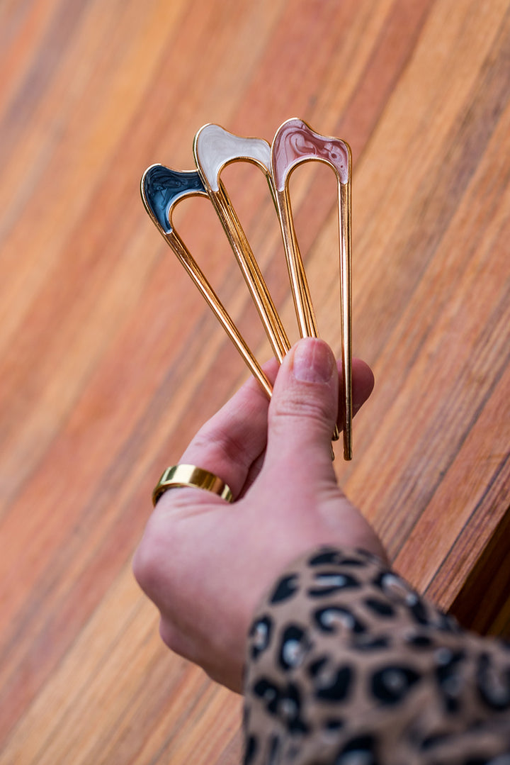 Chérie Gold Hair Pin with pearl accents in ivory, pink, and navy displayed